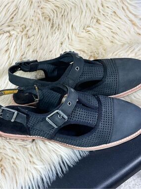 Perforated Black Slingback Mules with Buckle Detail